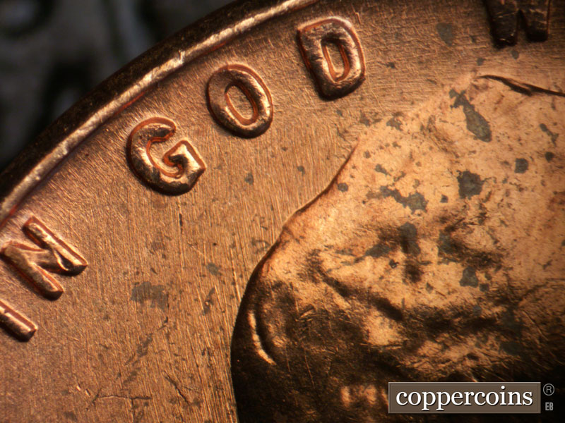 Die-stage B marker on 1963P•1DO•034 (1963 Doubled Die Obverse).