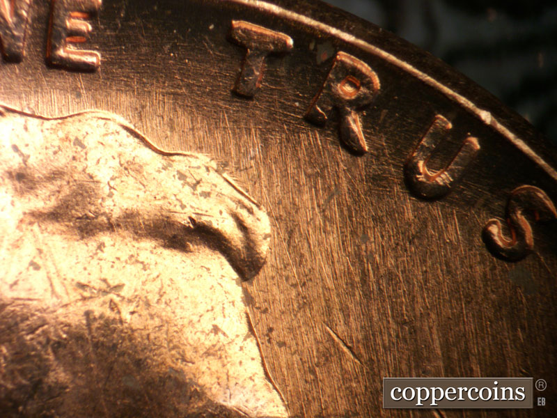 Die-stage B marker on 1963P•1DO•034 (1963 Doubled Die Obverse).