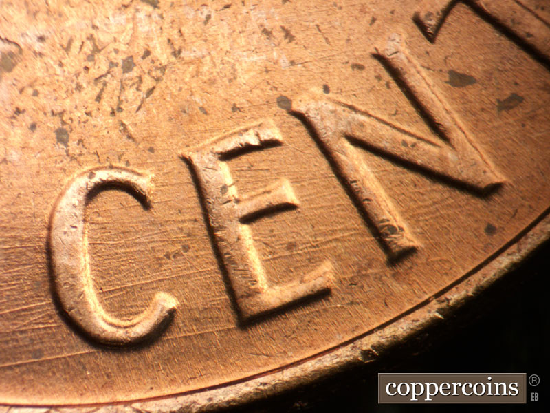 Die-stage B marker on 1963P•1DO•034 (1963 Doubled Die Obverse).