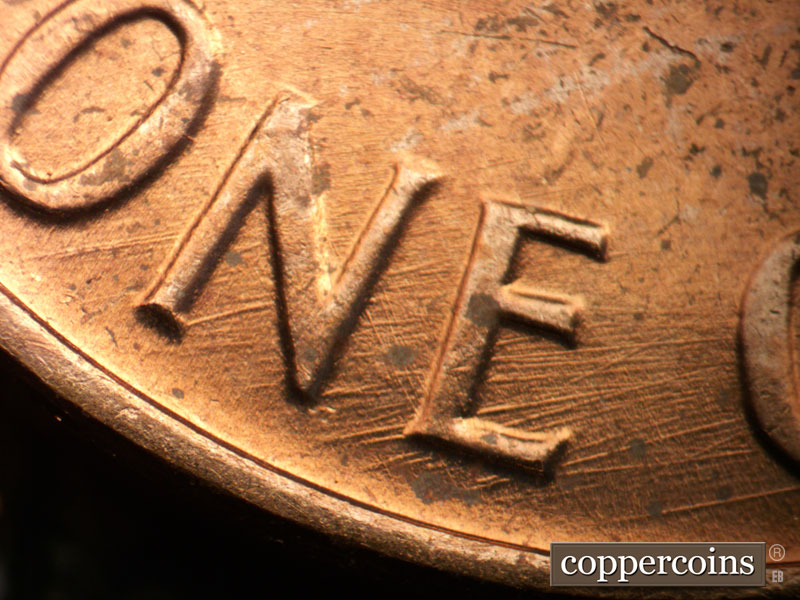 Die-stage B marker on 1963P•1DO•034 (1963 Doubled Die Obverse).