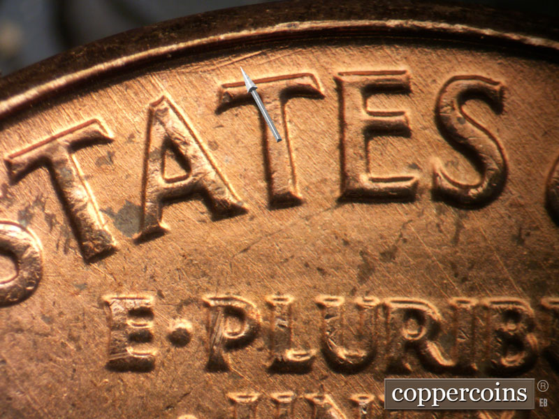 Die-stage A marker on 1963P•1DO•035 (1963 Doubled Die Obverse).