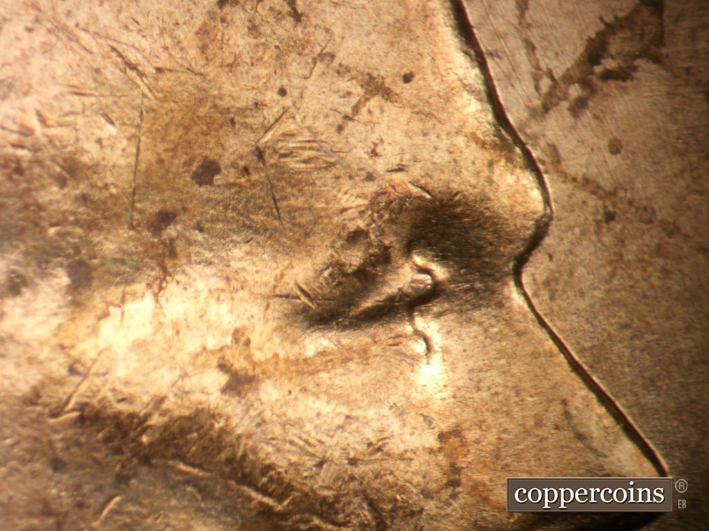 Die-stage B marker on 1963P•1DO•039 showing Doubled eyelid south of primary.