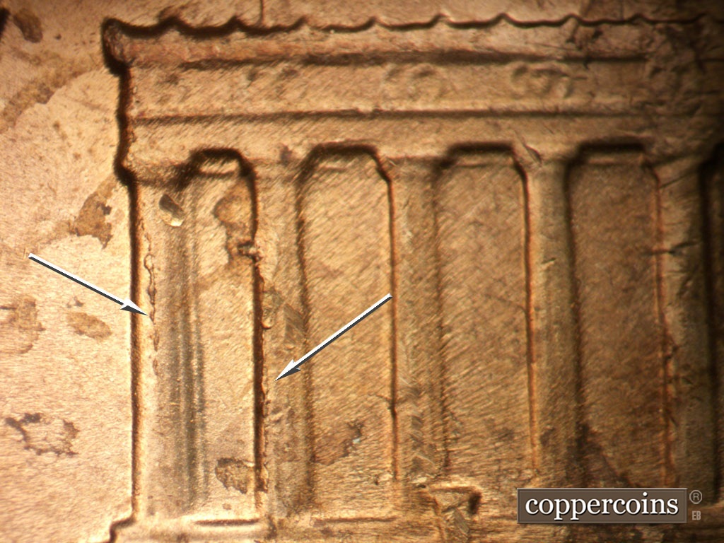 Die-stage B marker on 1963P•1DO•039 showing Die cracks on columns 1 and 2.