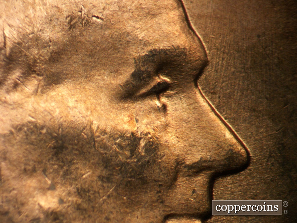 Die-stage B marker on 1963P•1DO•042 showing Extra eyelid south of primary.