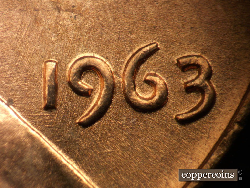 Die-stage B marker on 1963P•1DO•042 showing Date for reference. Light intersecting die scratches in field around 19 in date.