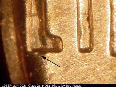 Die-stage B marker on 1963P•1DR•002 (1963 Doubled Die Reverse).