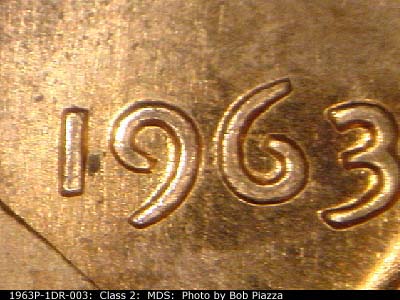 Die-stage B marker on 1963P•1DR•003 (1963 Doubled Die Reverse).