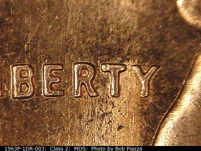 Die-stage B marker on 1963P•1DR•003 (1963 Doubled Die Reverse).
