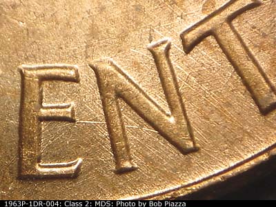 Die-stage B marker on 1963P•1DR•004 (1963 Doubled Die Reverse).