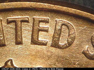Die-stage B marker on 1963P•1DR•004 (1963 Doubled Die Reverse).