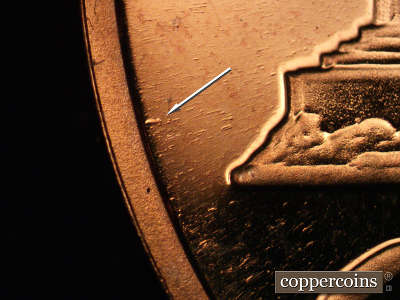 Die-stage A marker on 1963P•1DR•005P (1963 Doubled Die Reverse).