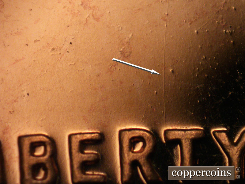 Die-stage A marker on 1963P•1DR•005P (1963 Doubled Die Reverse).