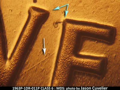 Die-stage B marker on 1963P•1DR•011P (1963 Doubled Die Reverse).