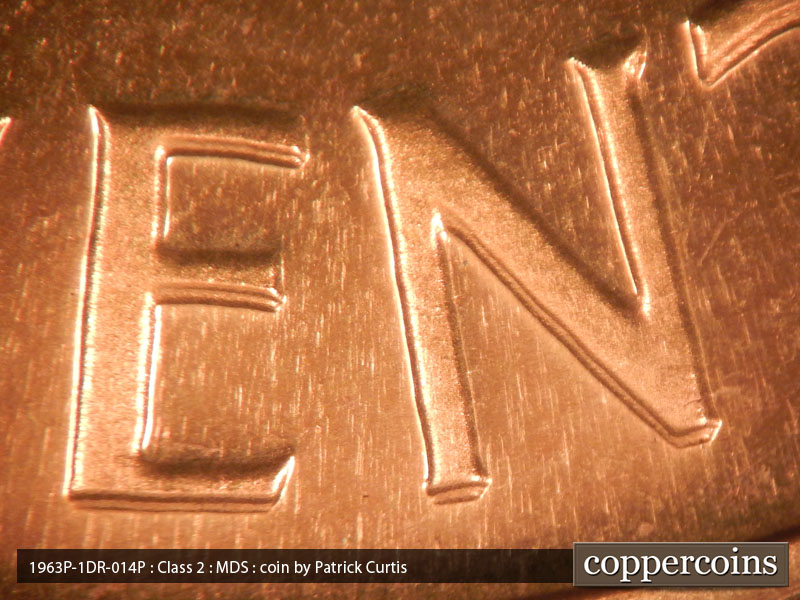 Die-stage B marker on 1963P•1DR•014P (1963 Doubled Die Reverse).
