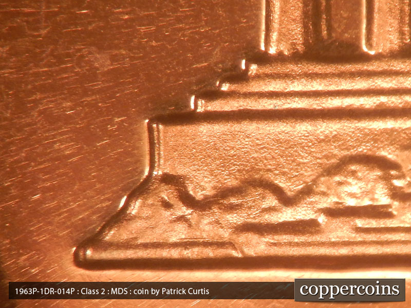 Die-stage B marker on 1963P•1DR•014P (1963 Doubled Die Reverse).