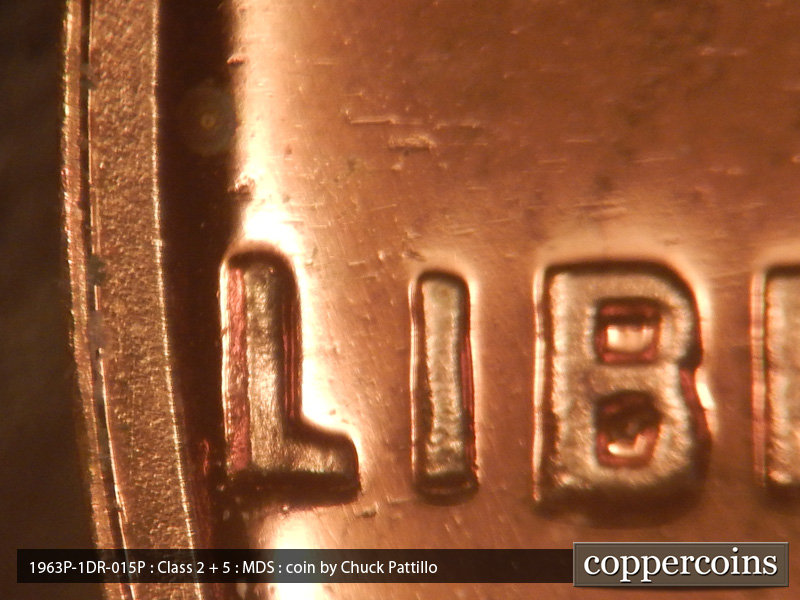 Die-stage B marker on 1963P•1DR•015P (1963 Doubled Die Reverse).