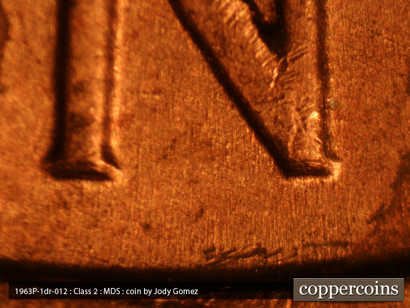Die-stage B marker on 1963P•1DR•019 (1963 Doubled Die Reverse).