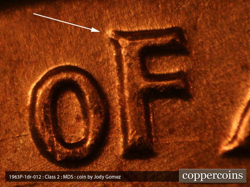Die-stage B marker on 1963P•1DR•019 (1963 Doubled Die Reverse).