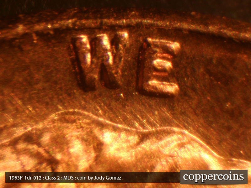 Die-stage B marker on 1963P•1DR•019 (1963 Doubled Die Reverse).