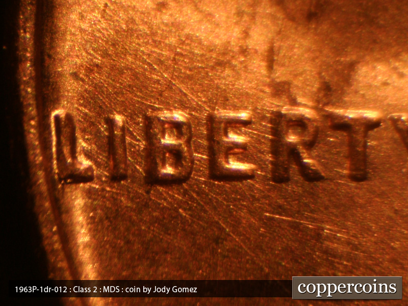 Die-stage B marker on 1963P•1DR•019 (1963 Doubled Die Reverse).