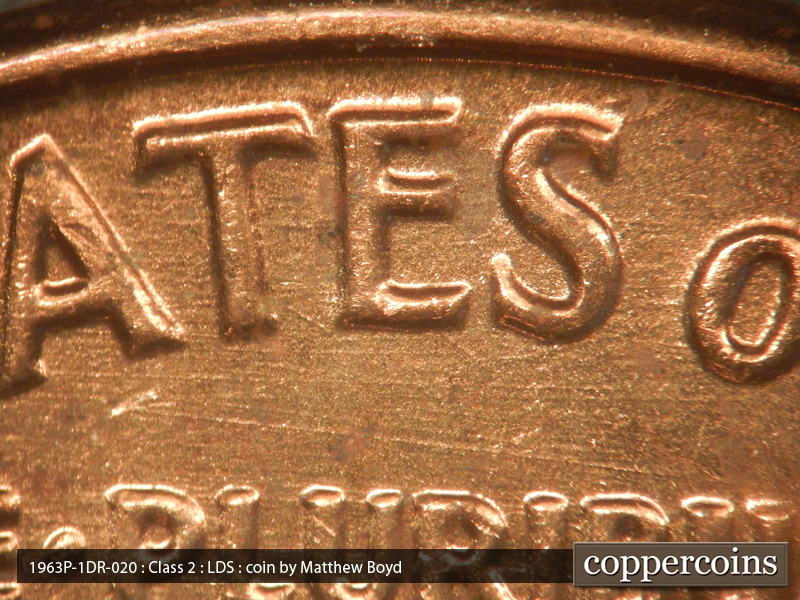Die-stage C marker on 1963P•1DR•020 (1963 Doubled Die Reverse).