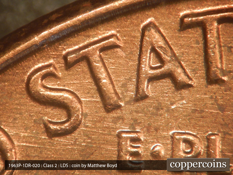 Die-stage C marker on 1963P•1DR•020 (1963 Doubled Die Reverse).