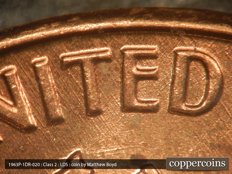 Die-stage C marker on 1963P•1DR•020 (1963 Doubled Die Reverse).