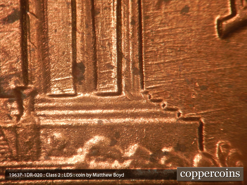 Die-stage C marker on 1963P•1DR•020 (1963 Doubled Die Reverse).