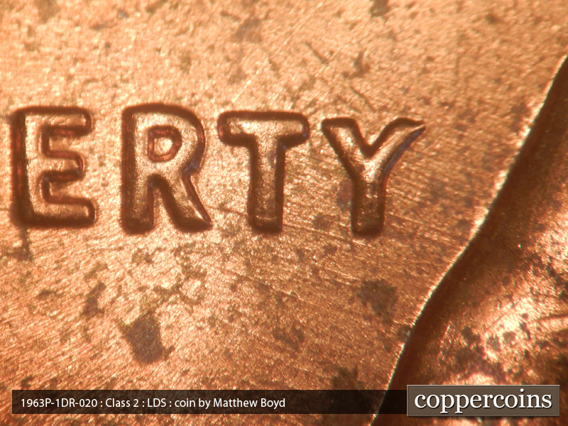 Die-stage C marker on 1963P•1DR•020 (1963 Doubled Die Reverse).