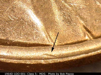 Die-stage B marker on 1964D•1DO•001 (1964 Doubled Die Obverse).