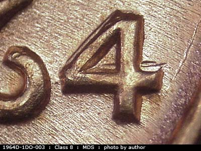 Die-stage B marker on 1964D•1DO•003 (1964 Doubled Die Obverse).