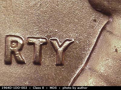 Die-stage B marker on 1964D•1DO•003 (1964 Doubled Die Obverse).