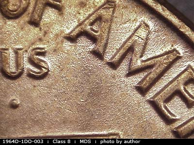 Die-stage B marker on 1964D•1DO•003 (1964 Doubled Die Obverse).