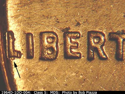 Die-stage B marker on 1964D•1DO•004 (1964 Doubled Die Obverse).