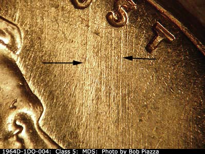 Die-stage B marker on 1964D•1DO•004 (1964 Doubled Die Obverse).