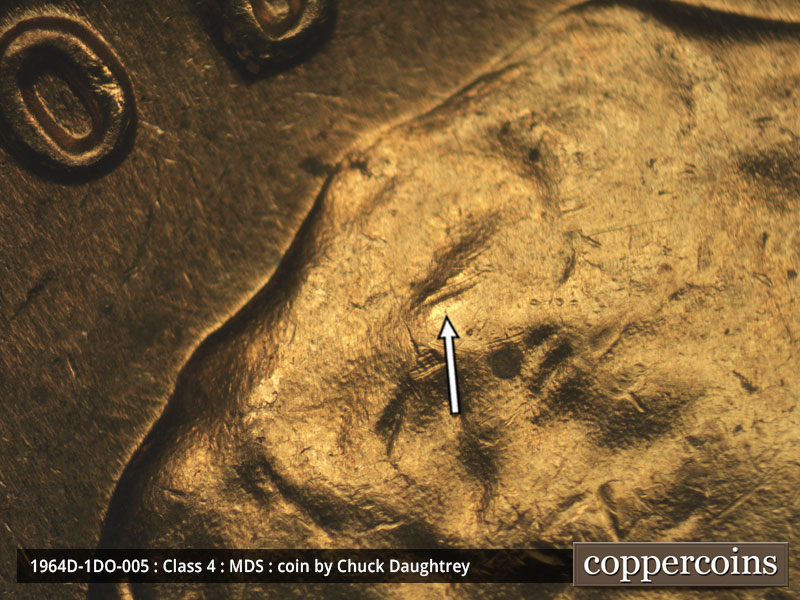 Die-stage B marker on 1964D•1DO•005 (1964 Doubled Die Obverse).