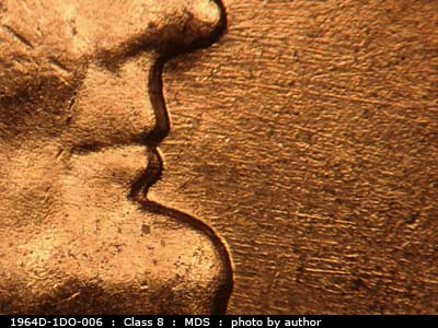 Die-stage B marker on 1964D•1DO•006 (1964 Doubled Die Obverse).