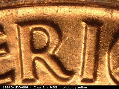 Die-stage B marker on 1964D•1DO•006 (1964 Doubled Die Obverse).