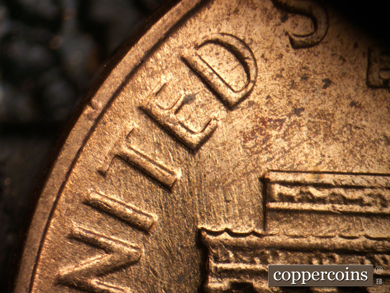 Die-stage B marker on 1964D•1DO•009 (1964 Doubled Die Obverse).