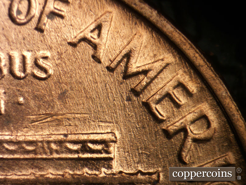 Die-stage B marker on 1964D•1DO•009 (1964 Doubled Die Obverse).