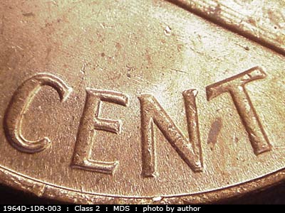 Die-stage B marker on 1964D•1DR•003 (1964 Doubled Die Reverse).