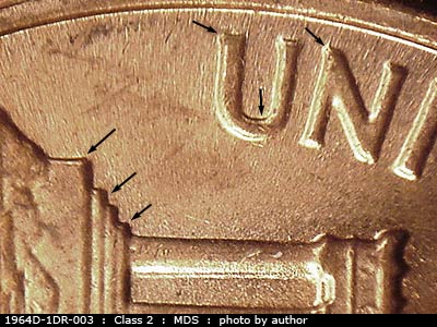Die-stage B marker on 1964D•1DR•003 (1964 Doubled Die Reverse).