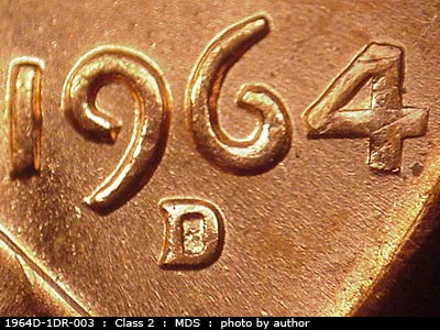 Die-stage B marker on 1964D•1DR•003 (1964 Doubled Die Reverse).
