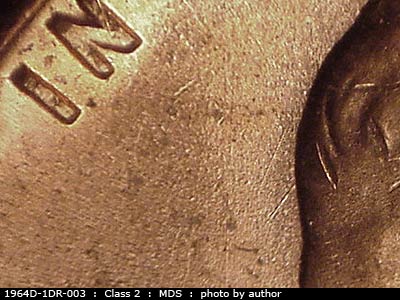 Die-stage B marker on 1964D•1DR•003 (1964 Doubled Die Reverse).
