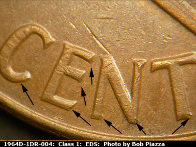 Die-stage A marker on 1964D•1DR•004 (1964 Doubled Die Reverse).