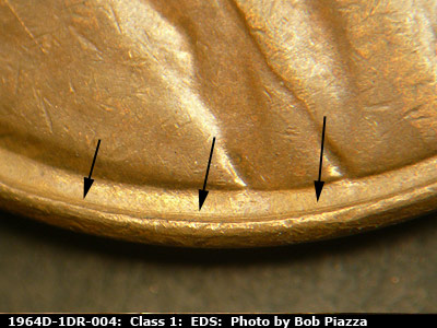 Die-stage A marker on 1964D•1DR•004 (1964 Doubled Die Reverse).