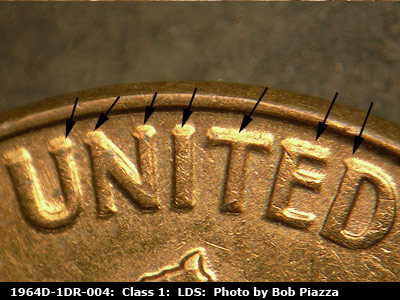 Die-stage C marker on 1964D•1DR•004 (1964 Doubled Die Reverse).