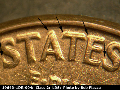 Die-stage C marker on 1964D•1DR•004 (1964 Doubled Die Reverse).