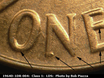 Die-stage C marker on 1964D•1DR•004 (1964 Doubled Die Reverse).