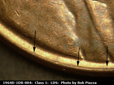 Die-stage C marker on 1964D•1DR•004 (1964 Doubled Die Reverse).